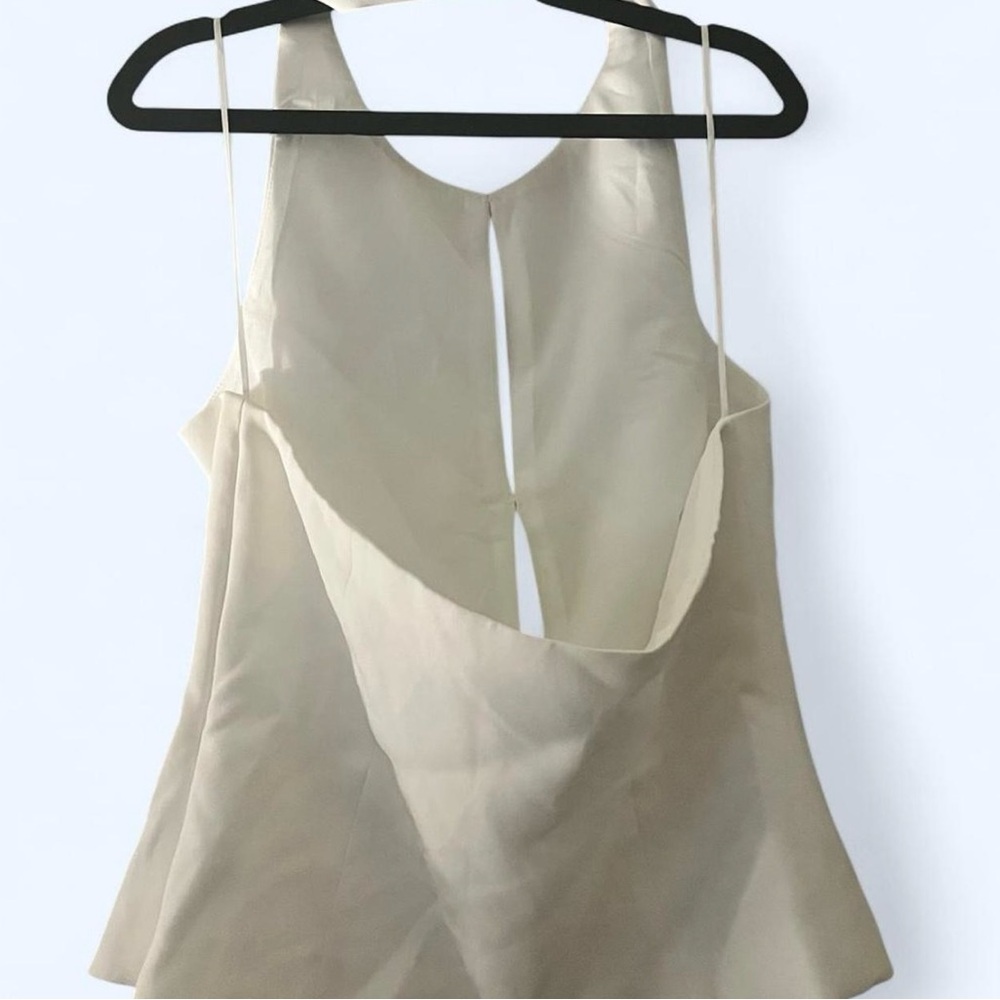Elegant Cream Sleeveless Top with Bow Accents - Picture 4 of 7